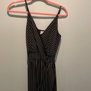 Black and white stripped pant suit. Excellent condition. 95%polyester. 5%spandex